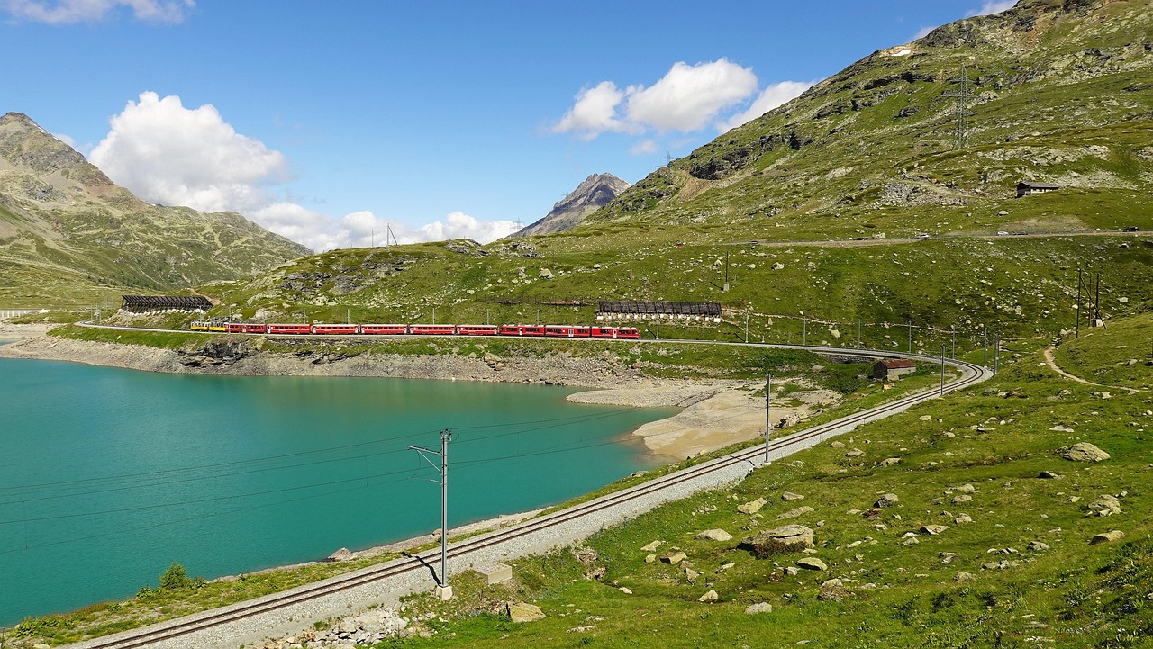 mountains lake train railway scenic switzerland